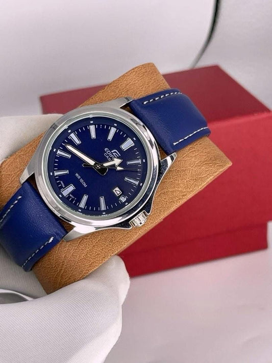 Montre homme Casio Edifice avec un cadran bleu nuit soleillé, index argentés, guichet dateur et un bracelet en cuir bleu classique.