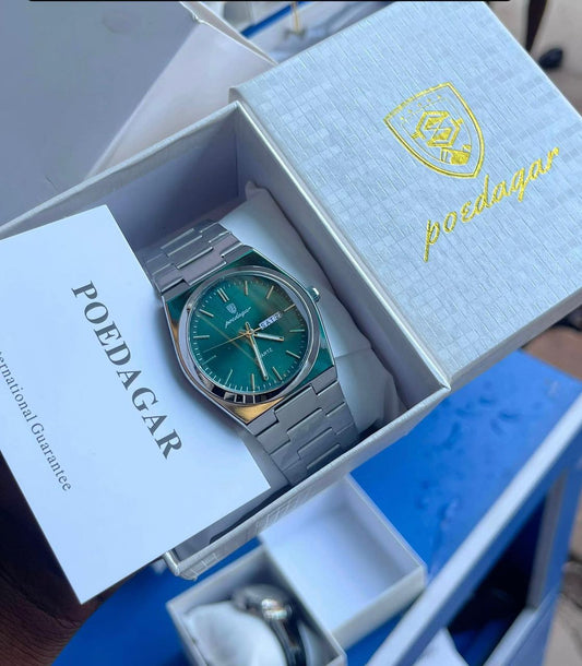 Montre de luxe Poedagar pour homme avec cadran vert émeraude soleillé, affichage calendrier double, et bracelet en acier argenté.